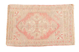 Vintage hand knotted Oushak rug mat with distressed blush and ivory geometric medallion.