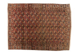 Vintage Turkmen carpet with repeating Bokhara guls and unique botanical borders. Chestnut, navy, ivory.