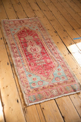 Distressed fringe, original selvage, and aqua blue border on a vintage Oushak runner.