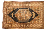 Vintage Distressed Northwest Persian rug, bold hexagonal medallion, dark blue-black and light bronze.
