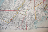 Antique map detail highlighting New Rochelle, Pelham, Larchmont, and the pale blue Long Island Sound.