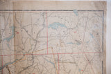 Antique Northern Westchester map with grid lines, blue reservoirs, aged patina.