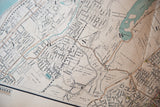 Aged antique map showing Yonkers, Scarsdale, detailed street grids, and green water.