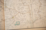 Antique map segment featuring Dickerson Pond, detailed property ownership, and connecting brown roads.
