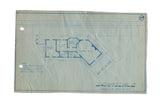 Vintage Scarsdale NY train station blueprint, aged blue paper with building layout and punch holes.