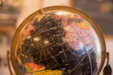 Mid Century Cram's black globe surface showing the North Atlantic and paper peeling.