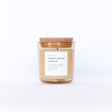 Sandalwood and Amber Slow North soy candle, 8 oz. glass jar with cork lid.