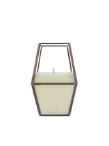Copper Lantern Candle with geometric frame, creamy white wax, and visible wick.