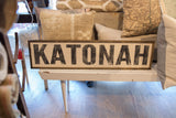 Katonah Vintage Style Sign, close-up of distressed black 'ONAH' letters, wood frame.