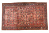 Vintage Mahal carpet, allover palmette floral design, cherry red with visible foundation, navy border.