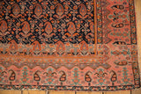 Antique Malayer rug corner: fuschia raspberry border with black paisley, navy boteh field.