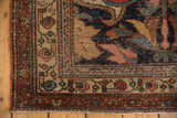 Antique Kurdish Bijar rug corner: dark madder red border, beige geometric band, worn pile.