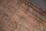 Antique Lilihan rug with aged pile, showing knot heads, dusty raspberry, and sky blue border.