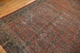 Vintage Mahal carpet features madder red henna motif, isolated foundation wear, tattered border.