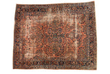 Antique Lilihan carpet with dusty rose floral design, navy border, mostly even wear, 9'2