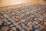 Allover Herati motif in navy blue and madder root with even pile wear.