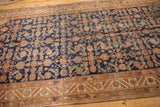 Vintage Hamadan, Herati and starburst motifs in navy blue and copper, visible pile wear.