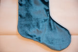 Velvet stocking foot in silvery teal with plush texture and subtle color variations.