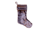 Light plum velvet stocking featuring a soft, lustrous texture.