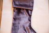 Plush light plum velvet stocking cuff showcasing the fabric's soft shimmer.