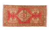 Distressed Oushak rug mat, raspberry central medallion, ivory and brown geometrics.