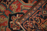 The intact original side cord selvage and hand-knotted back of a vintage Persian Heriz rug.