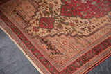 Corner detail of Vintage Farahan Sarouk rug: cherry red floral border, antique ivory field, delicate floral motifs.