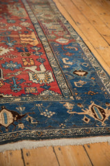 Persian Bijar rug's navy blue main border with samovar turtle motifs and white fringe.
