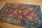 Bijar rug's blue samovar turtle border, rich red Harshang field, abrashes, and fringe.