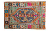 Distressed Oushak rug, multi-color diamond medallion and spandrels. 2'10
