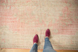 Vintage Distressed Oushak Carpet texture showing mostly even wear in blush, pink, and ivory.