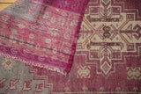 Distressed Oushak runner pile and reverse, with faded aubergine, ivory, and visible foundation.