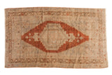 Vintage distressed Oushak rug, stepped rust medallion on an ivory and grey field, 4'4