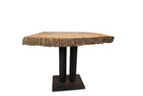Unique small live edge wooden table with rustic top and black iron base.