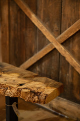 Natural gnarly live edge of the reclaimed wood side table.