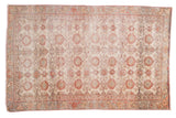 Distressed vintage Sivas rug, allover floral pattern in sand, ivory, brick red, and slate.
