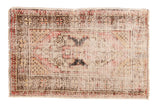 Distressed vintage Oushak rug with faded cherry red medallion, coffee brown elements, and sand ivory field.