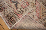 Hand-knotted reverse and pile of a distressed Oushak rug, showing mostly even wear and foundation.