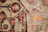 Distressed hand-knotted pile with visible knot heads and colorful Oushak rug foundation.