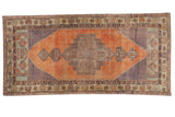 Distressed Vintage Oushak runner, stepped medallion, tangerine orange, muted purple and pale green.