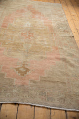 Vintage Distressed Oushak runner pile texture in beige and dusty terracotta.