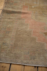 Vintage Distressed Oushak runner showing low pile texture and soft blush tones.