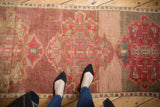 Distressed Oushak runner with faded aubergine, rose, fuchsia tones and unique abrashed texture.