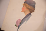Angled view of the antique Paul Meylan lithograph, displaying artist signature and 1910 copyright.