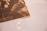 Close-up of the original Famous Players Lasky Corporation copyright on the antique film still.