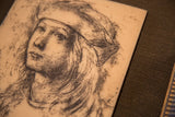 Textured lines and portrait detail of the vintage Artini engraving.