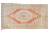 Vintage distressed Oushak carpet, burnt orange medallion, antique ivory field, 6'10