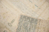 Distressed vintage Oushak rug with low pile, worn texture, and tightly woven reverse side.