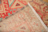 Vintage Distressed Oushak runner reverse showing hand-knotted foundation, side selvage, and fringe.