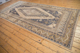Vintage Turkish Oushak rug corner, wide serrated leaf border, dusty navy and ivory.